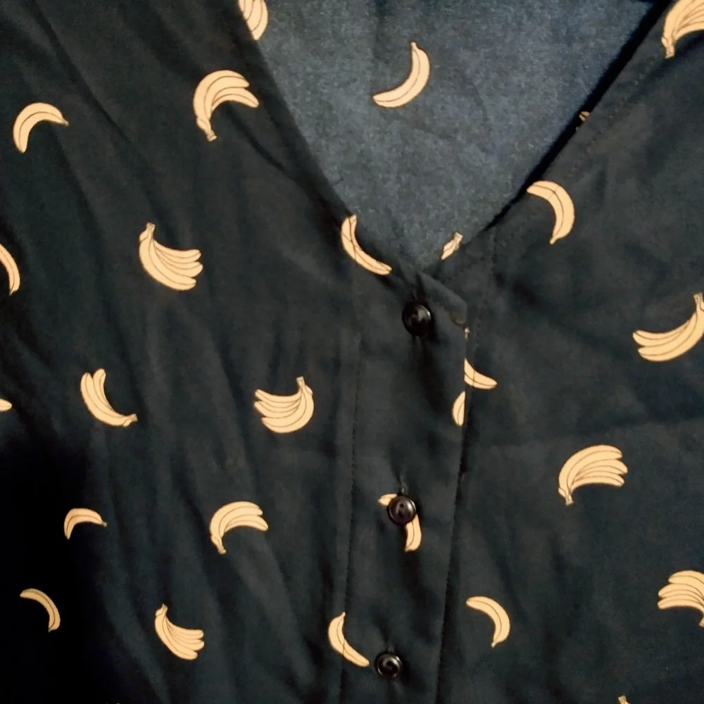 Charming Charlie banana print Navy button up long sleeve top. Size XL